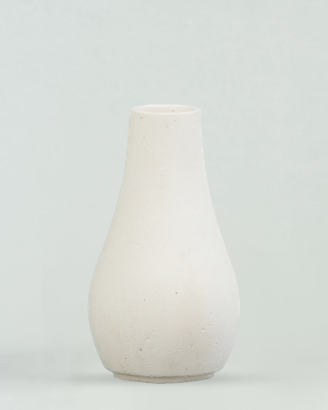 Pearlescent Charm: White Concrete Bottle in Pear Shape