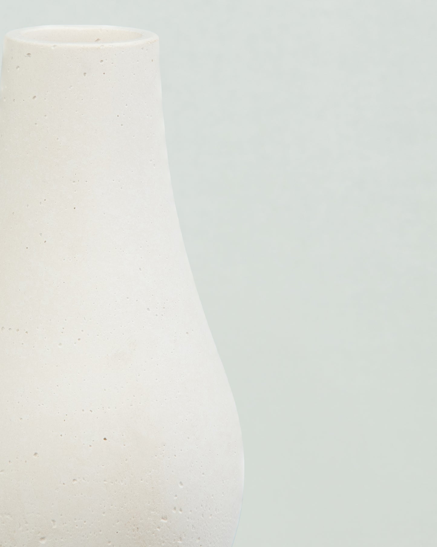 Pearlescent Charm: White Concrete Bottle in Pear Shape