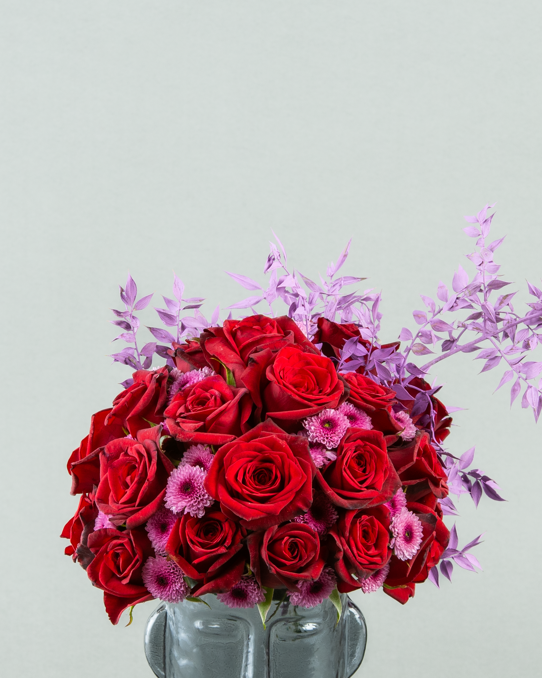 The Face: 30 Red Roses with Lilac Chrysanthemum and Italian Ruscus