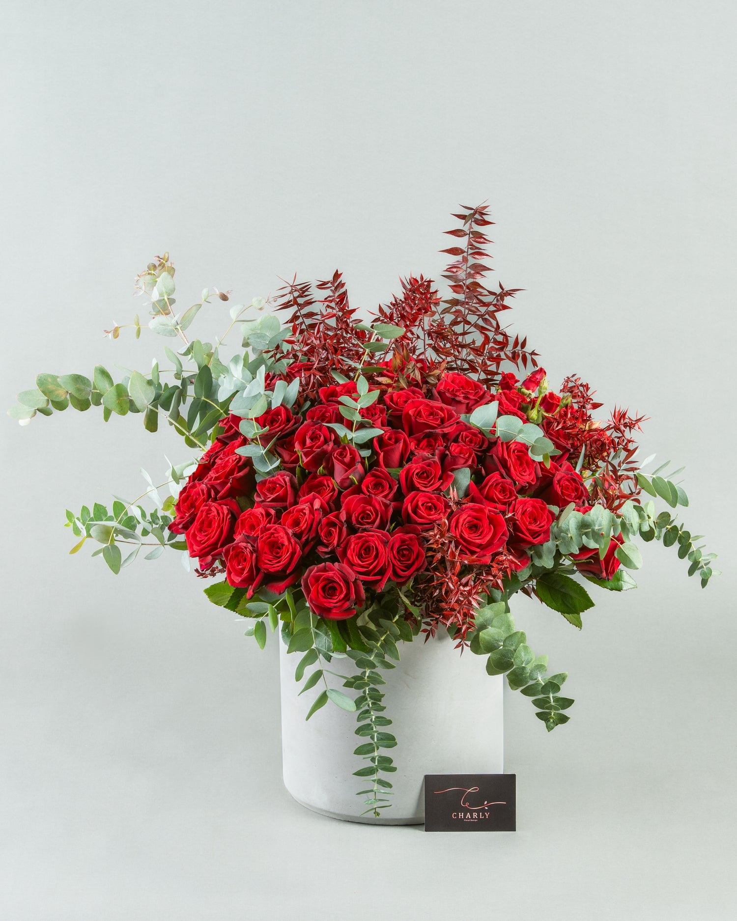 Majestic Red Rose Elegance in Large Cylinder Concrete Planter