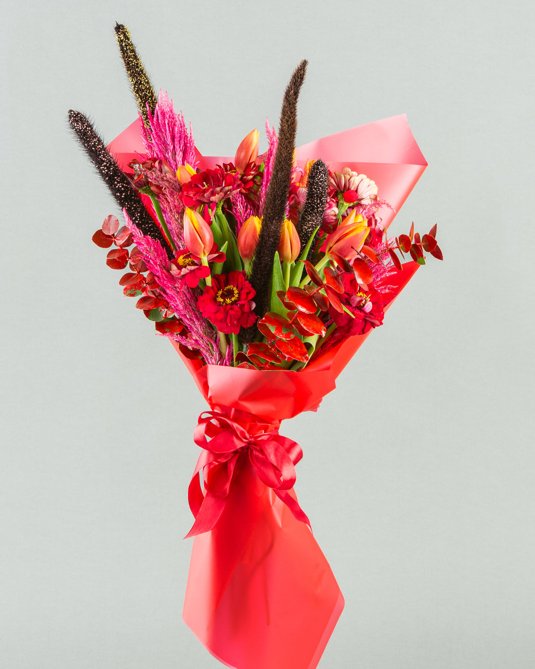 Autumn Glow: Orange Tulips with Corn, Zinnia, and Accents