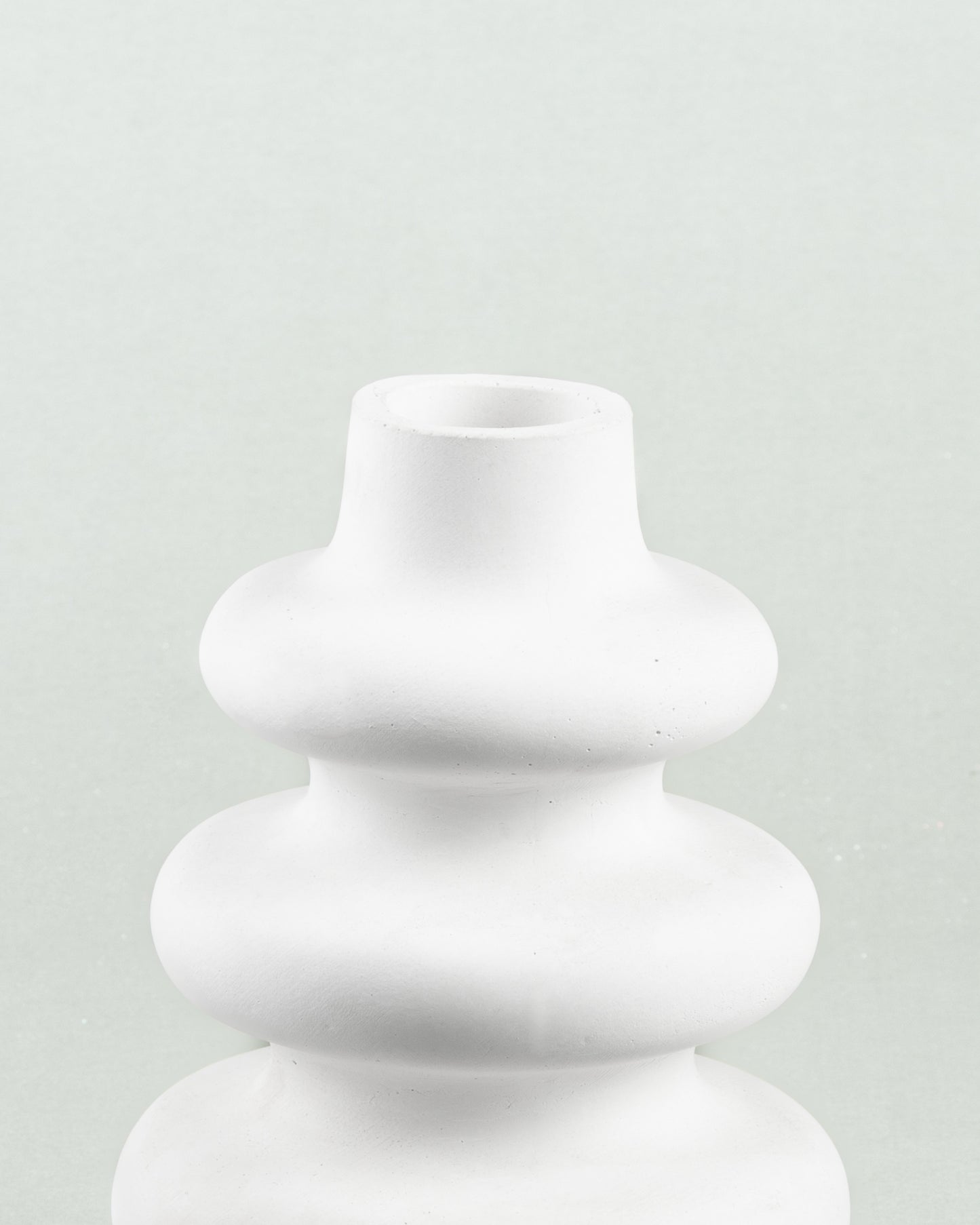 Triple Elegance: Three-Loop White Flower Vase