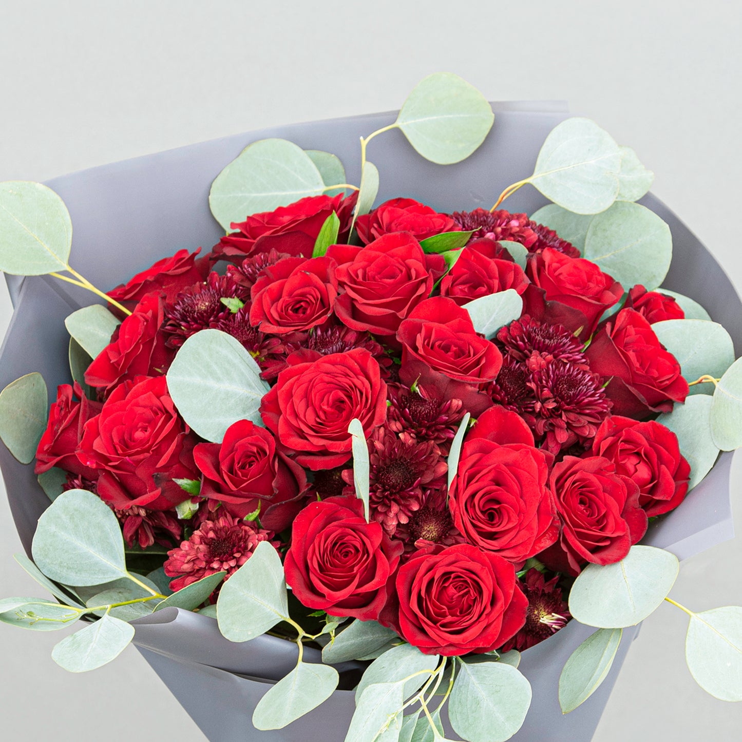 A Bold Bouquet Made From 20 Red Roses with Eucalyptus and Red Chrysanthemum