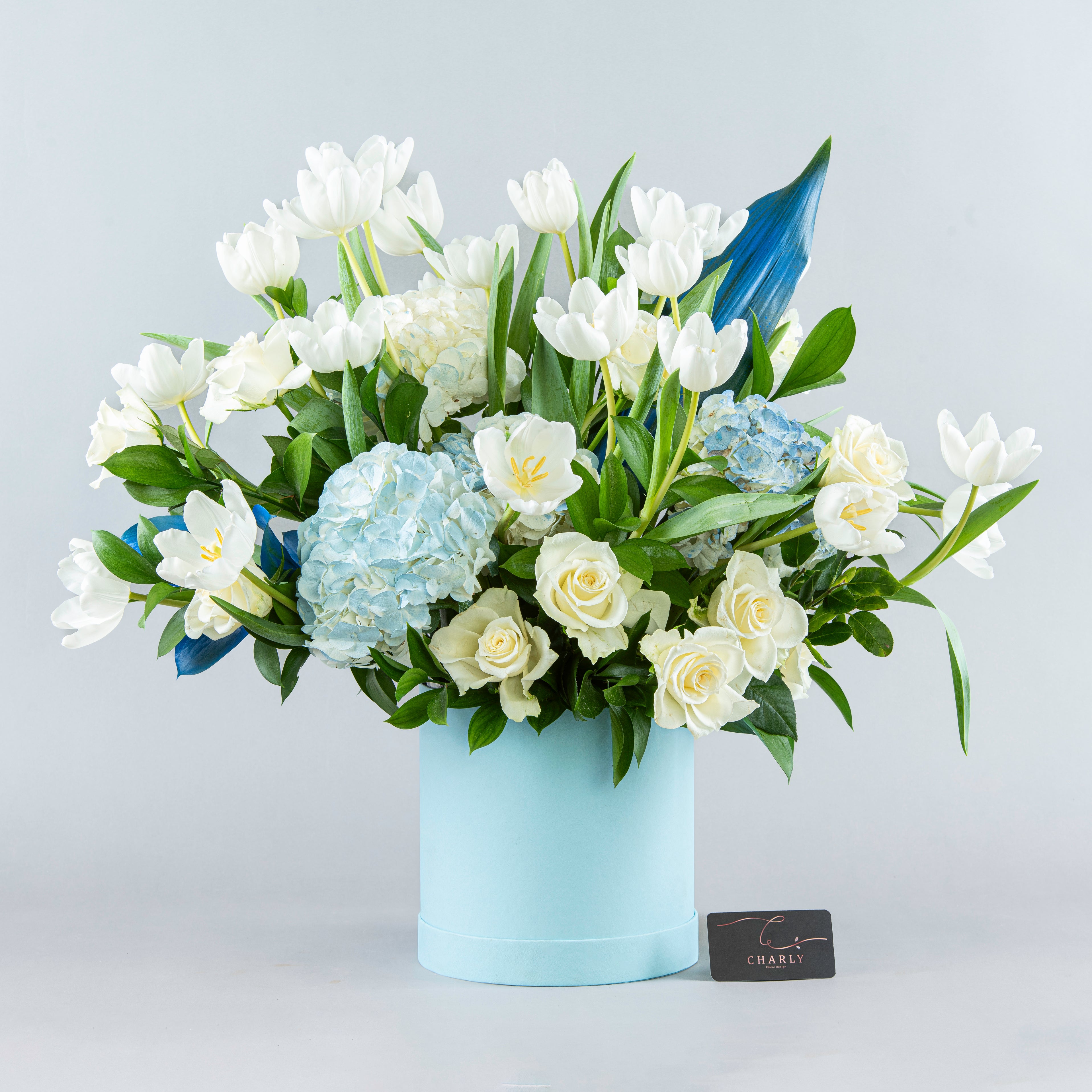 Azure Elegance: White Tulips, Roses, and Hydrangea in Blue Box