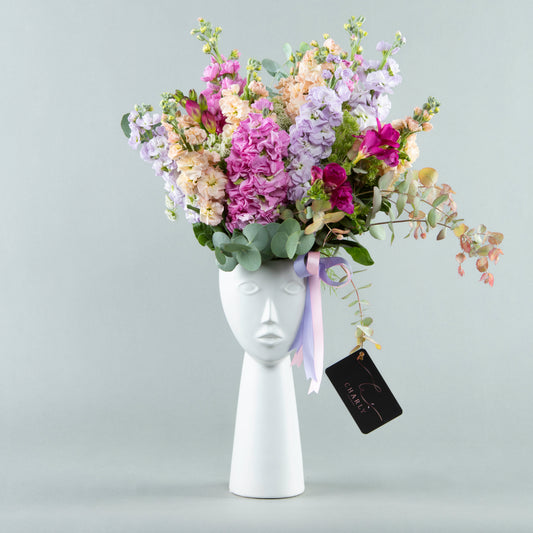 Expression of Elegance: Colored Girofle in Porcelain Face Vase