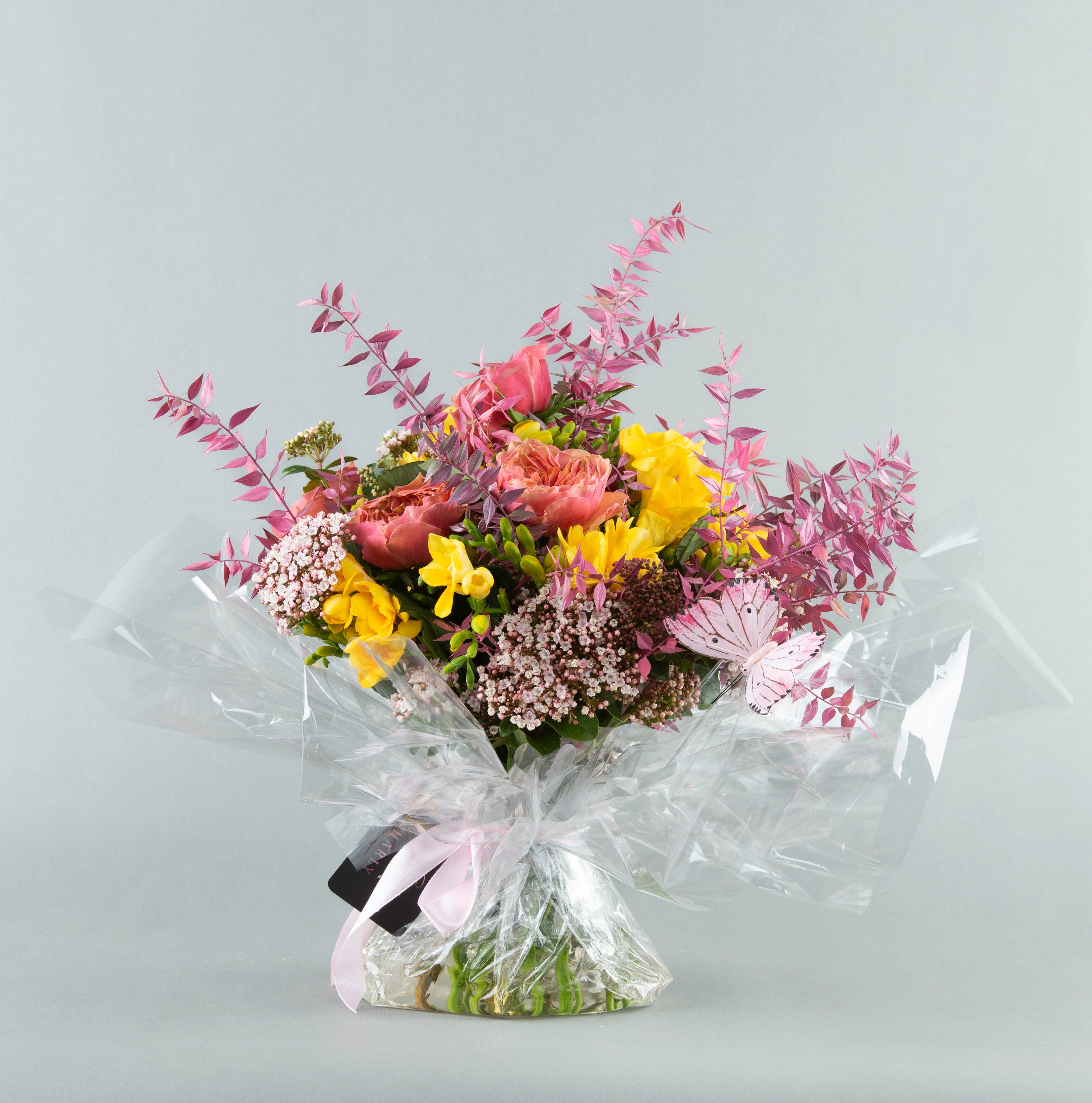 Citrus Elegance: English Rose and Freesia Ensemble in Custom Water Packaging