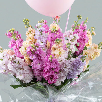 Vibrant Festivity: Colorful Girofle Bouquet with Helium Balloons