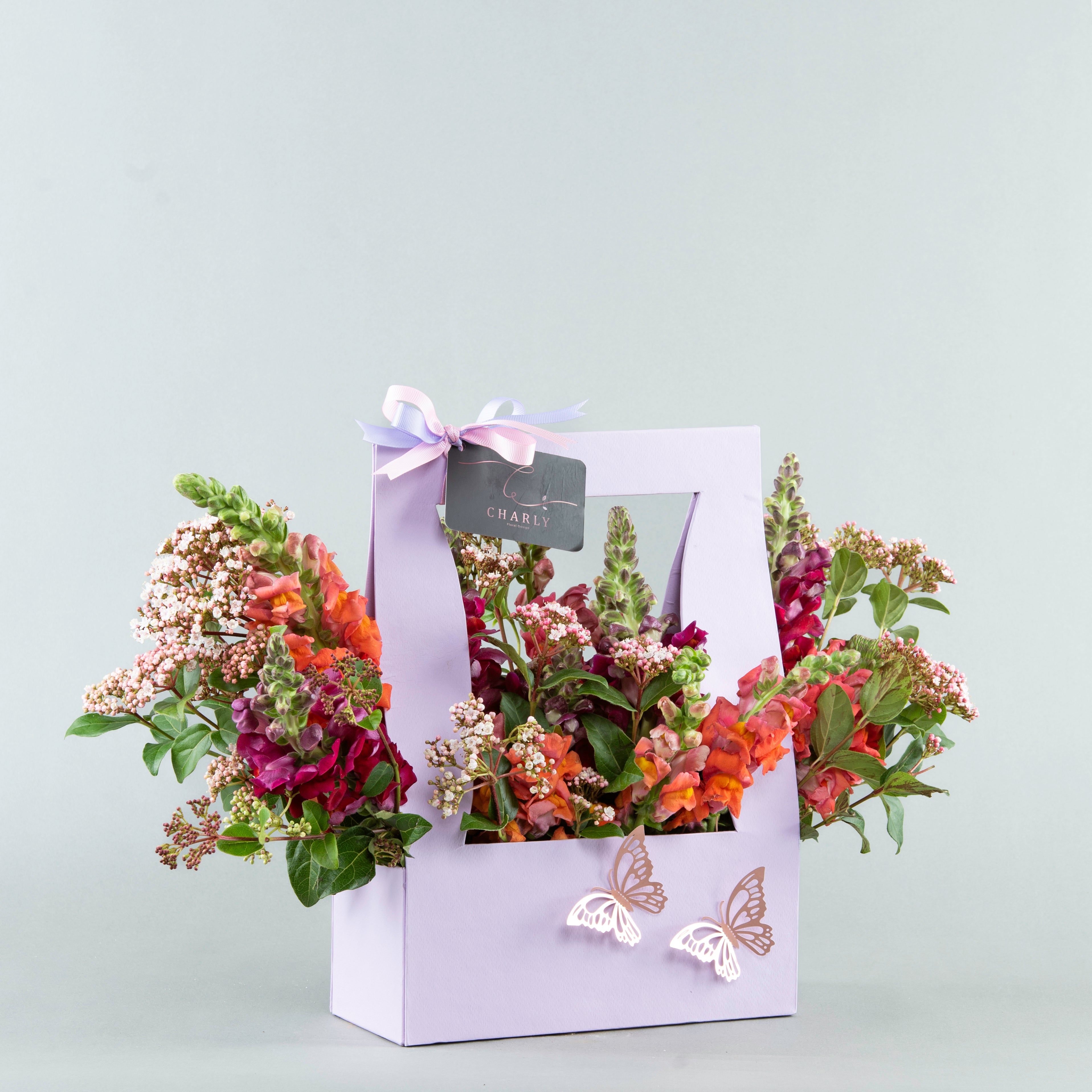 Lavender Elegance: Antirrhinum and Viburnum in Modern Bag