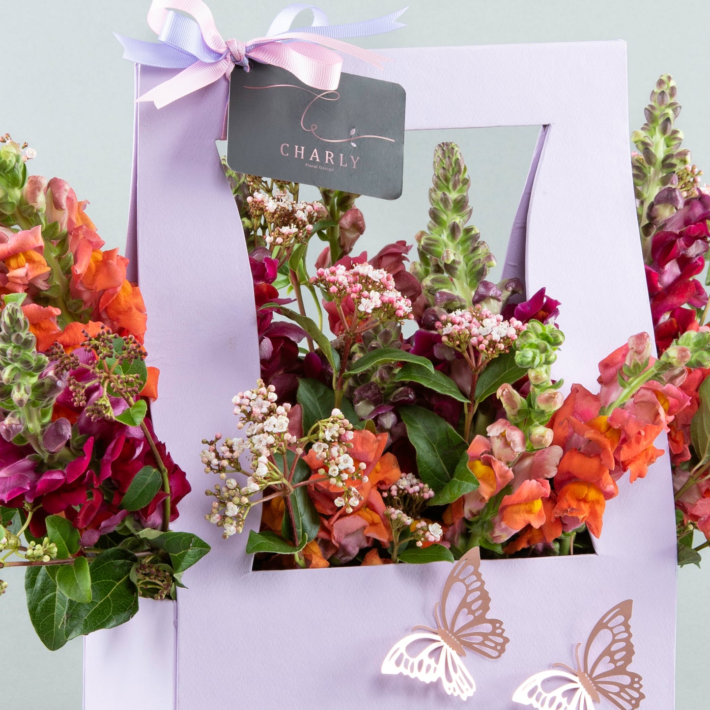 Lavender Elegance: Antirrhinum and Viburnum in Modern Bag