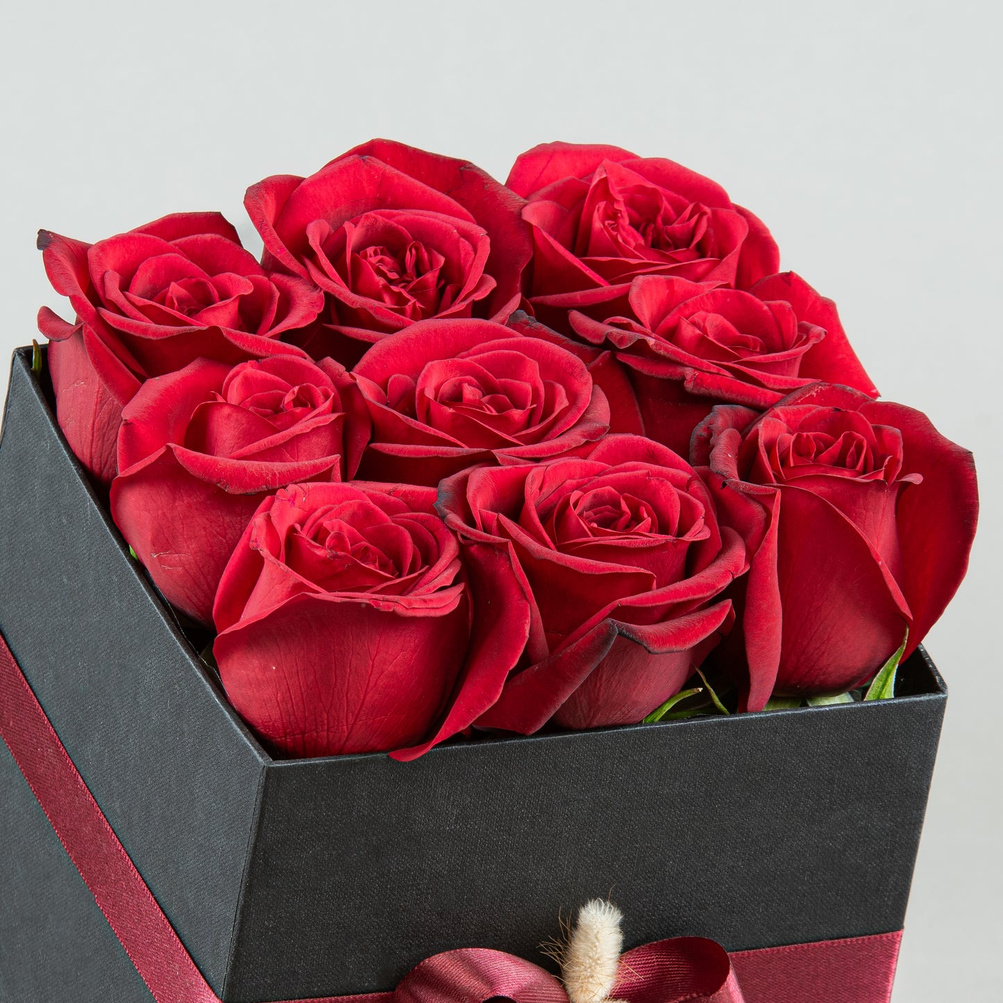 Elegant Noir: Red Roses in Black Square Box