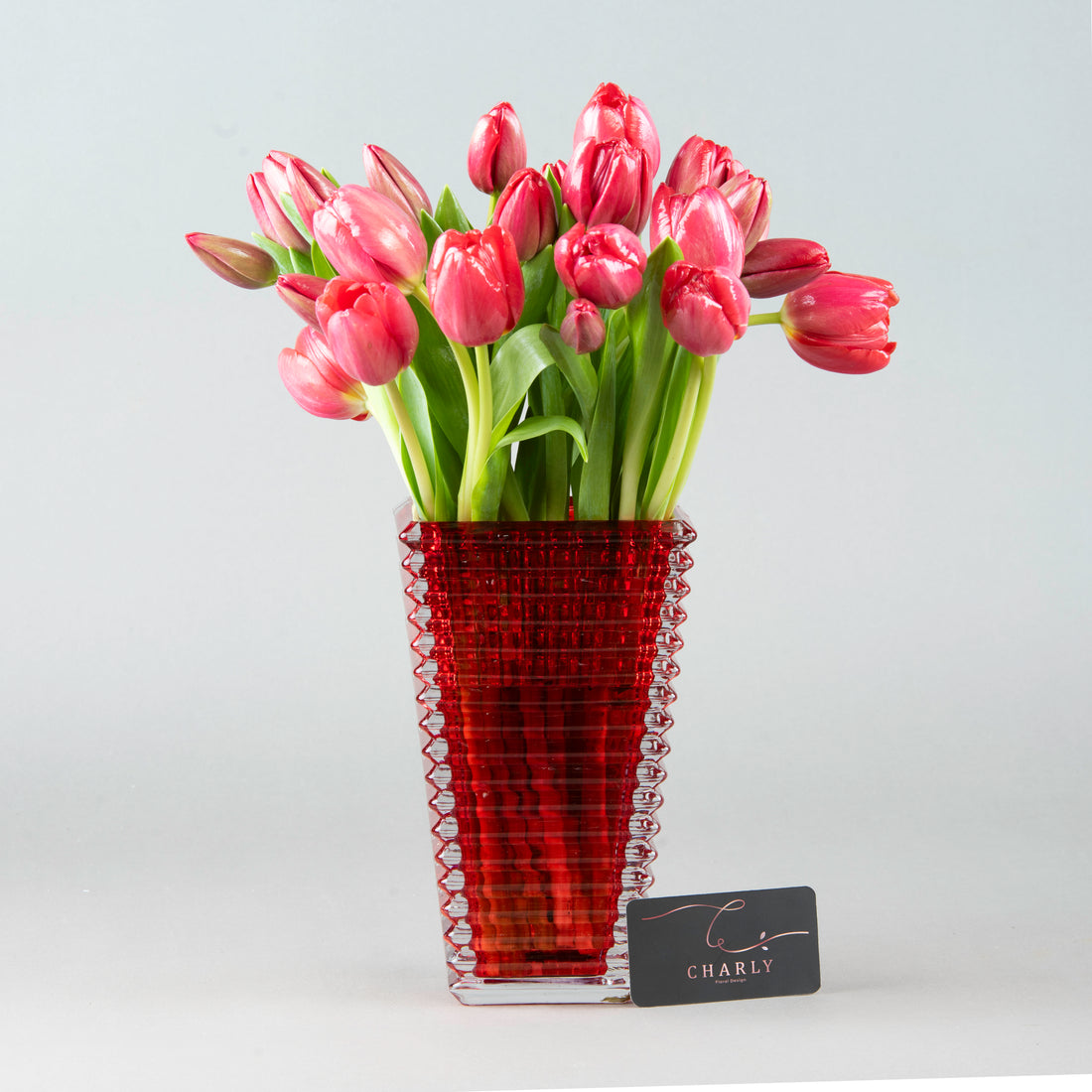 Radiant Tulip Elegance: Red Tulips in Baccarat Crystal Vase