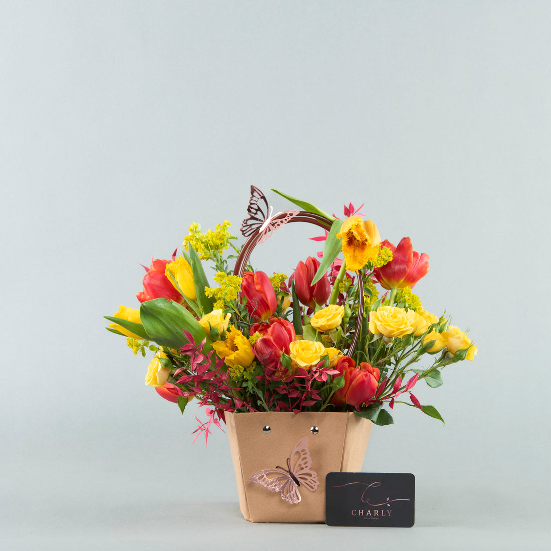 Sunburst Elegance: Modern Bag with Tulips and Baby Roses