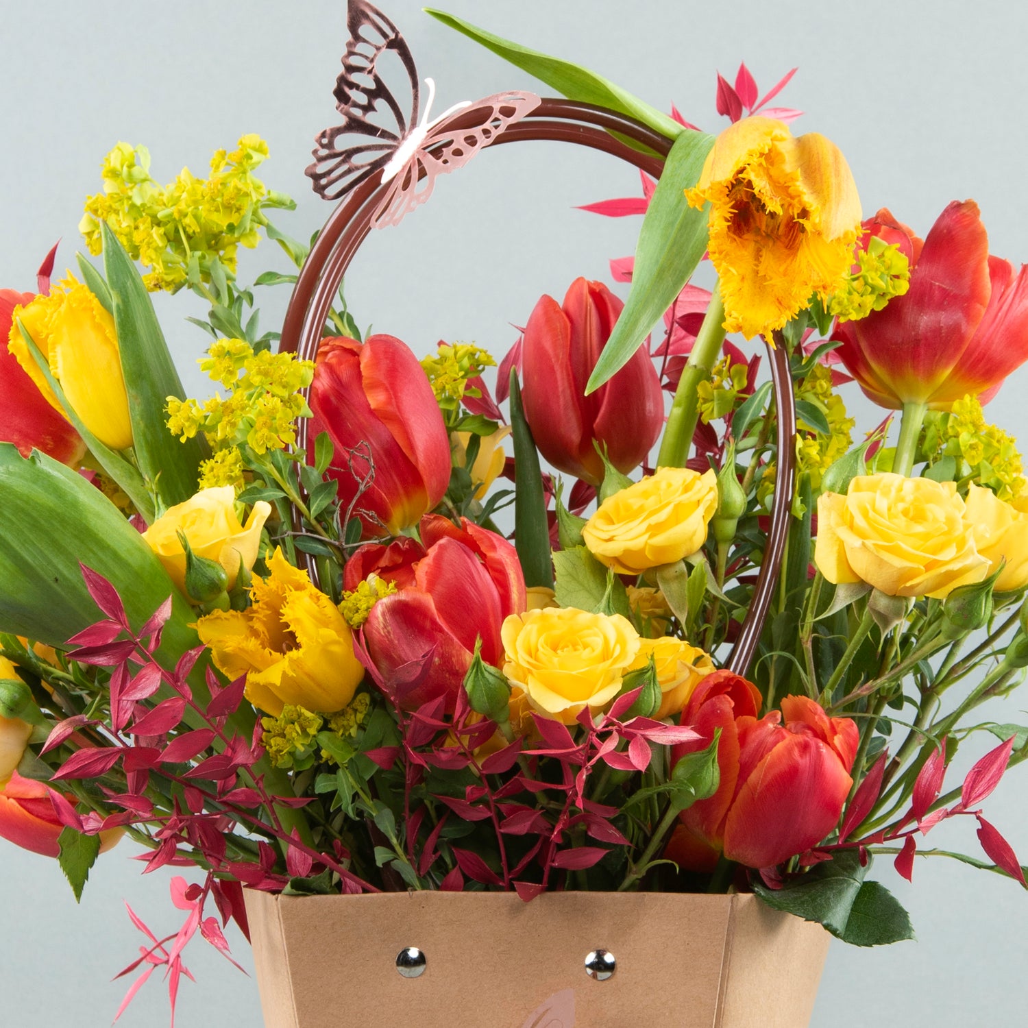 Sunburst Elegance: Modern Bag with Tulips and Baby Roses