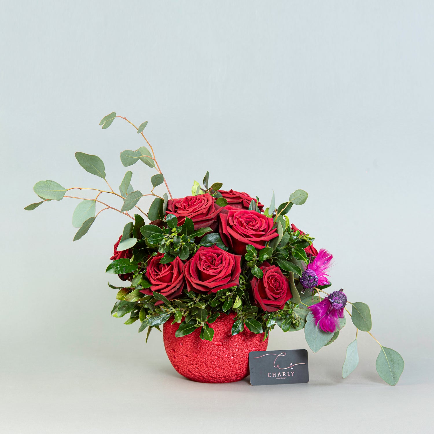 Lunar Rouge: Red Roses in Red Moon Rock Vase