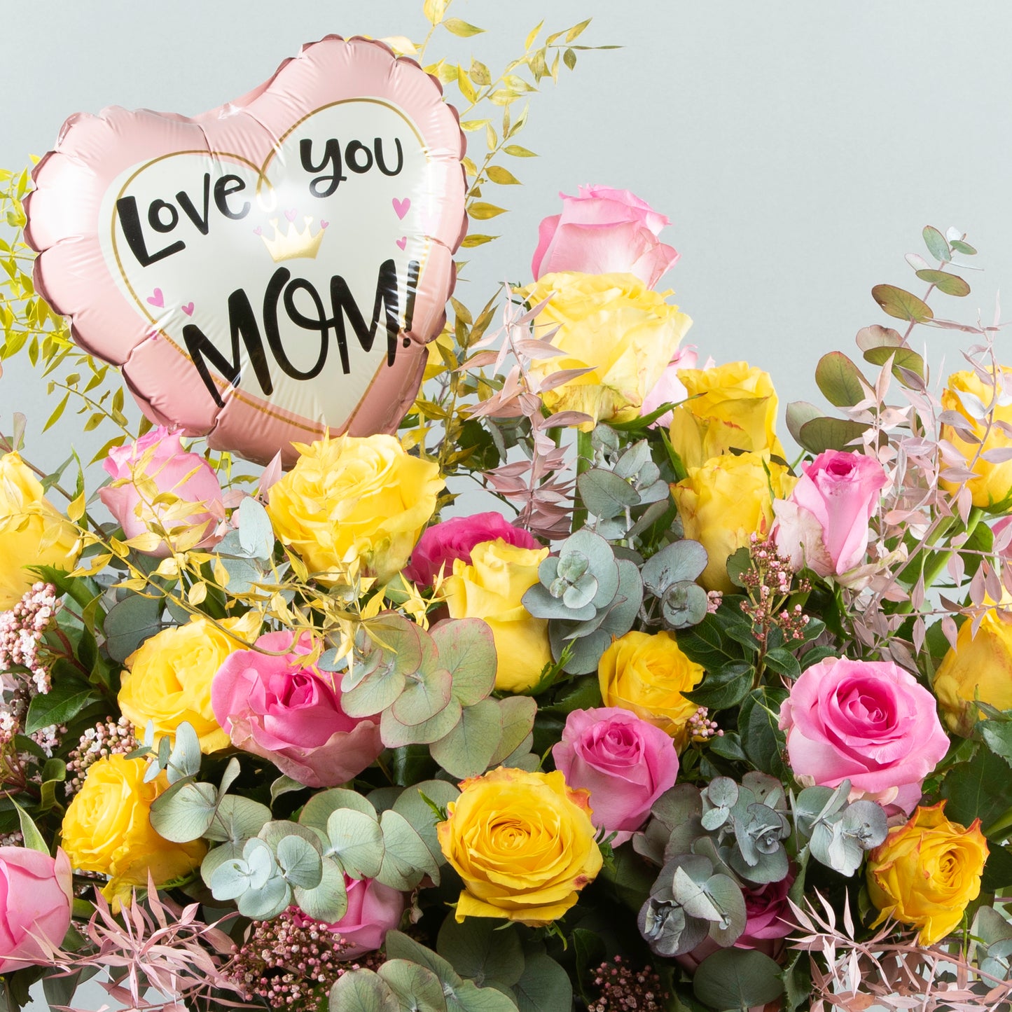 Bountiful Love: Mixed Floral Tribute with 'Love You Mom' Balloon