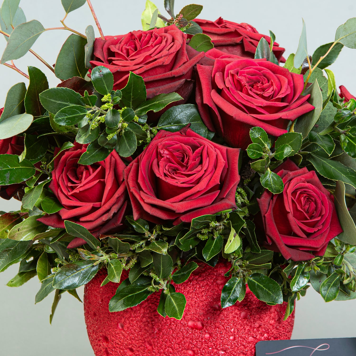 Lunar Rouge: Red Roses in Red Moon Rock Vase