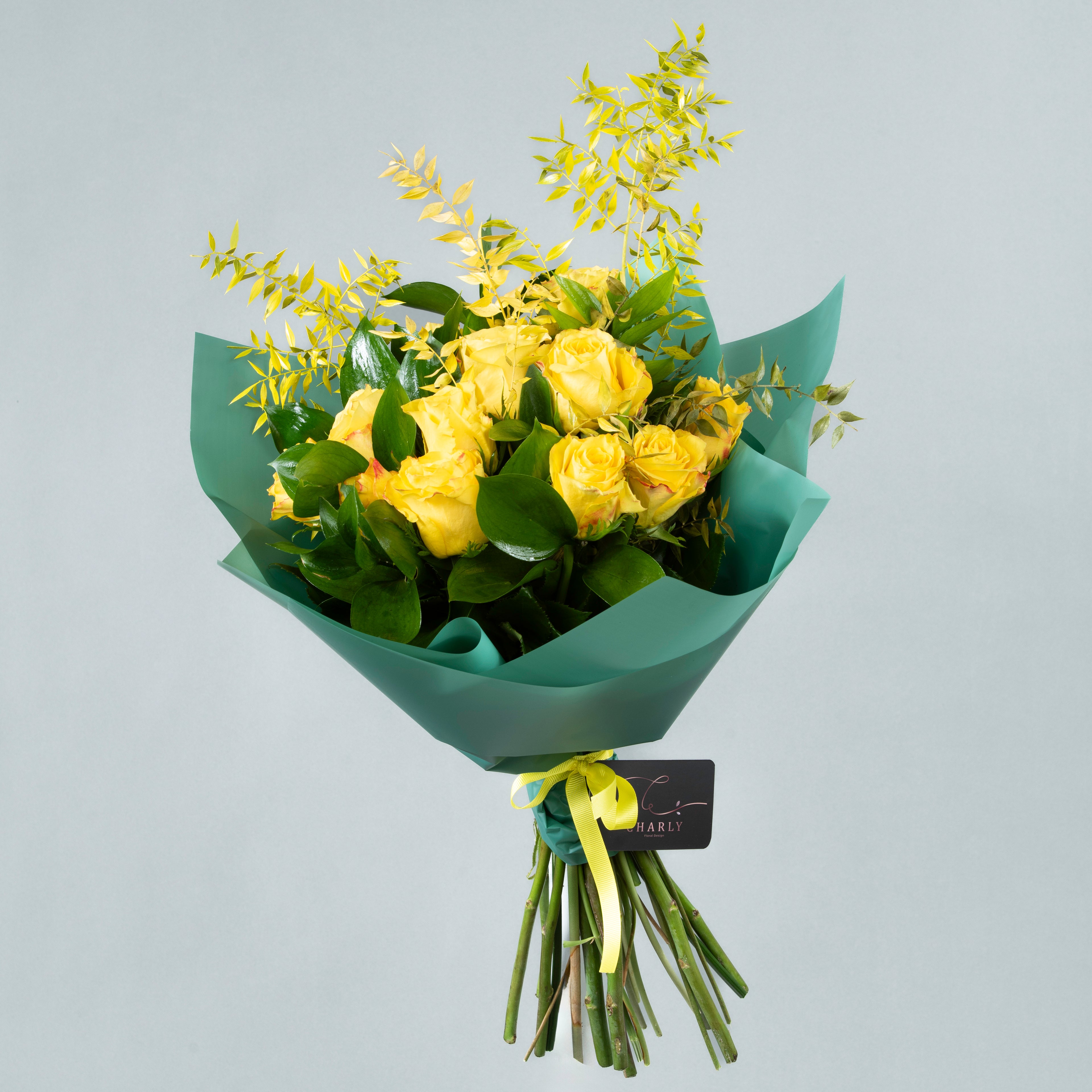 Golden Harmony: Yellow Flowers with Italian Ruscus Bouquet