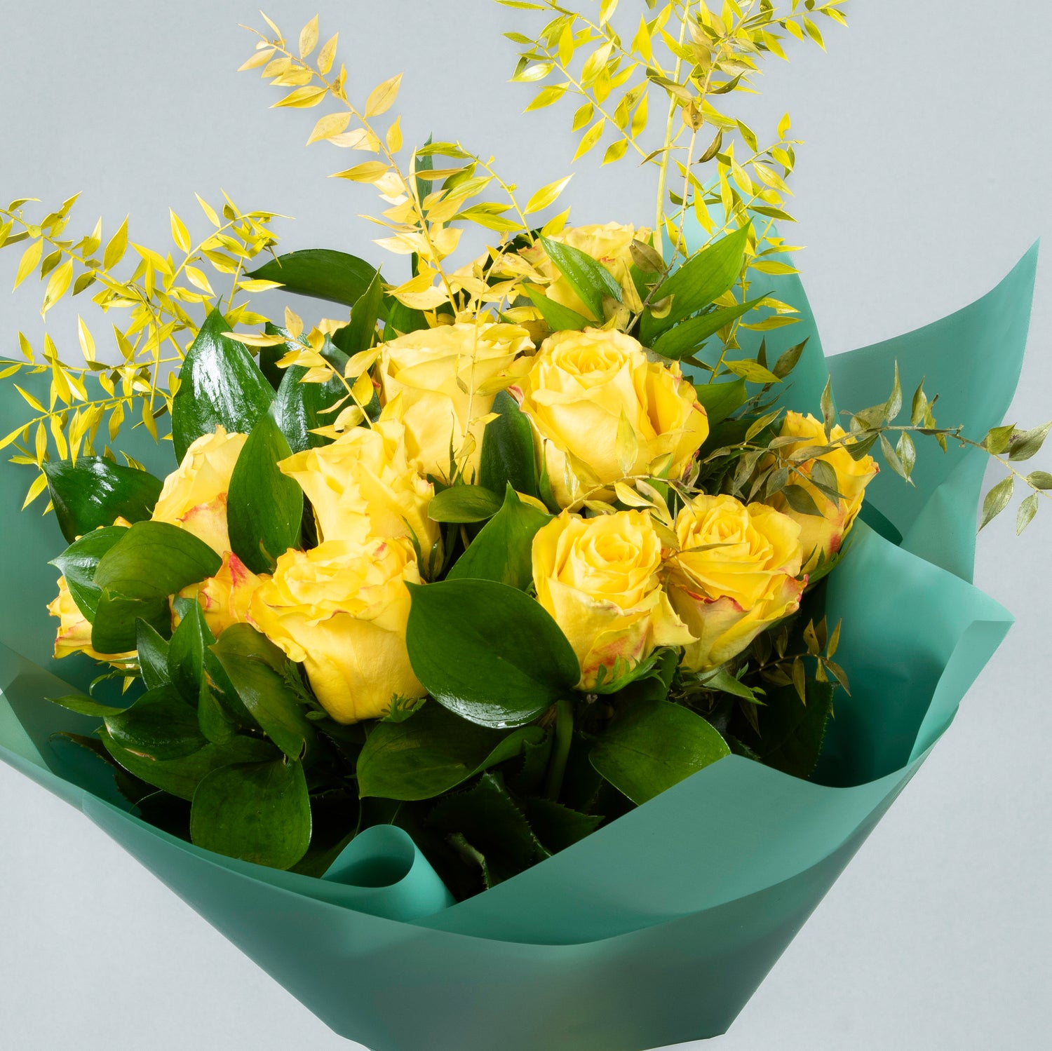 Golden Harmony: Yellow Flowers with Italian Ruscus Bouquet