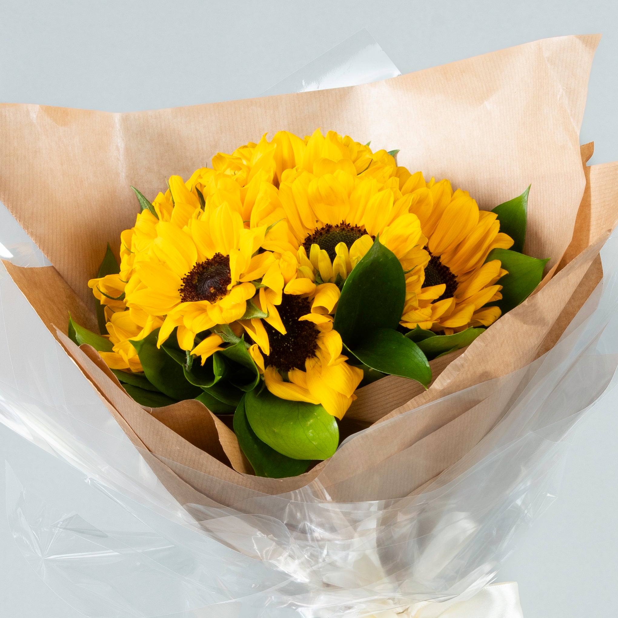 Sunshine Embrace: Sunflower and Ruscus Bouquet