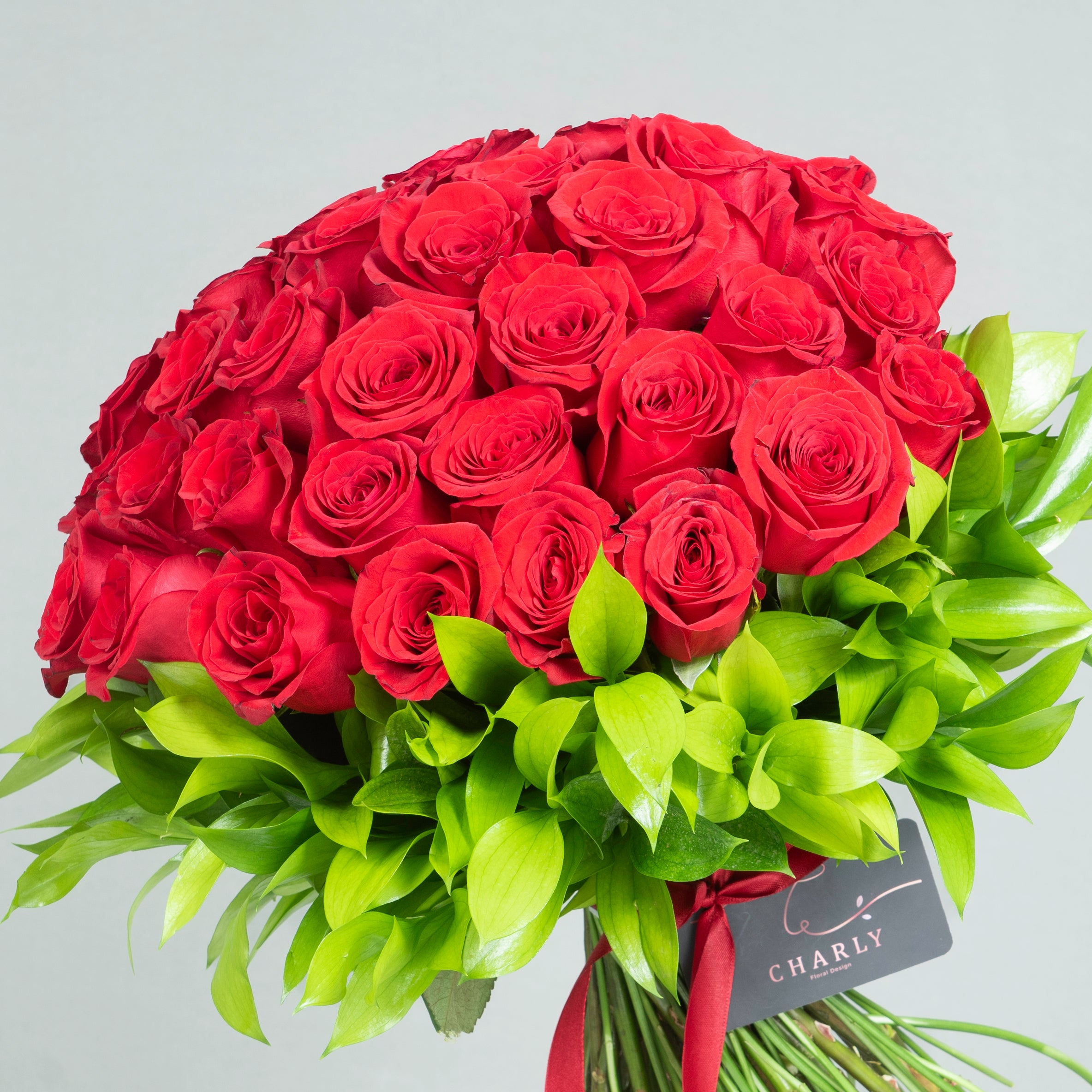 Boundless Love: Three Dozen Red Roses with Greenery