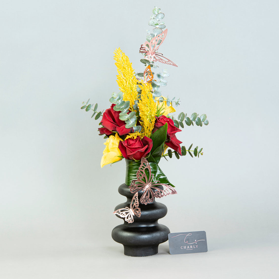 Triple Harmony: Roses and Eucalyptus in Three-Loop Vase