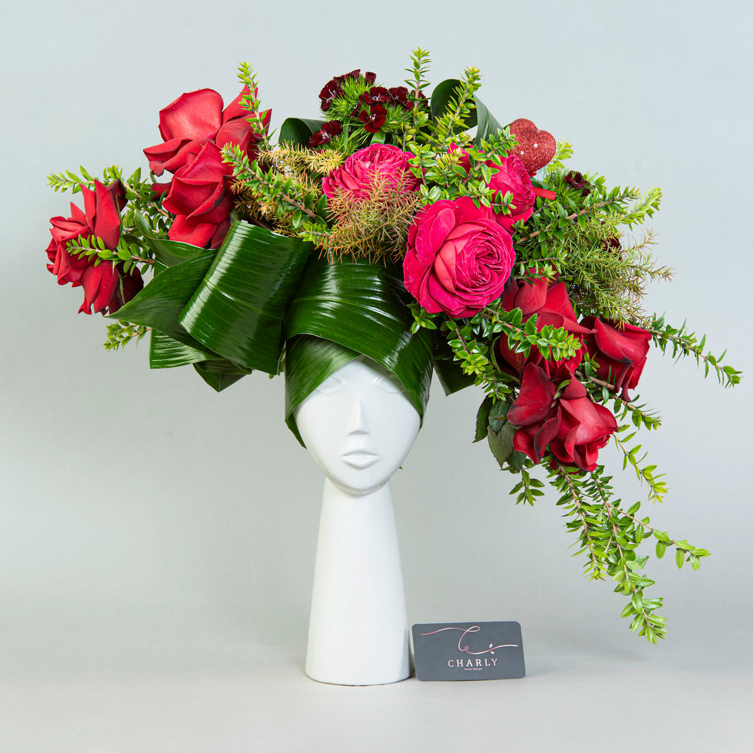 Ethereal Blossom Elegance: Roses and Aspidistra in Porcelain Face Vase