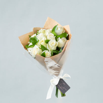 Eternal Grace: Dozen Pure White Flowers with Greenery