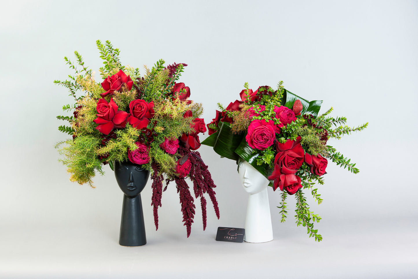 Dual Expression: Red Rose and Amaranthus Arrangement with Porcelain Faces