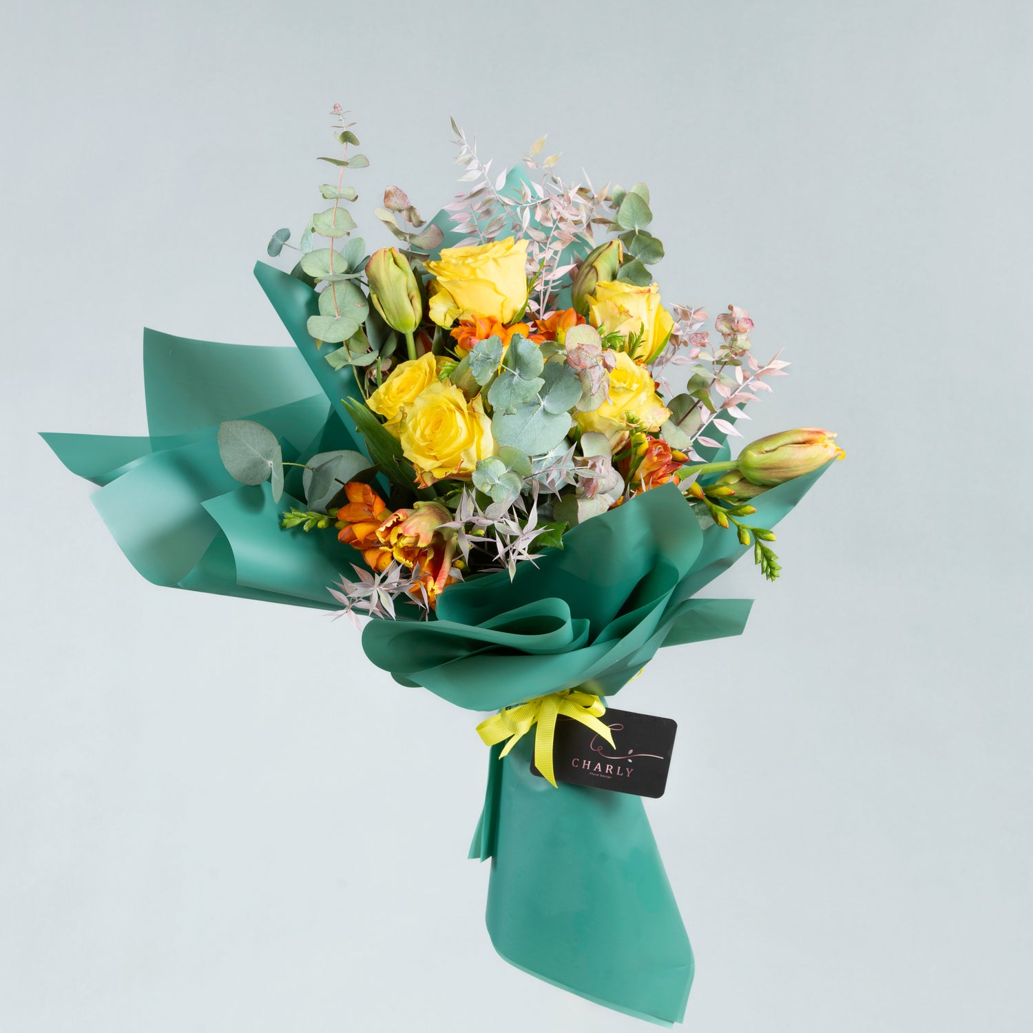 Sunburst Embrace: Yellow Roses and Orange Tulips Bouquet