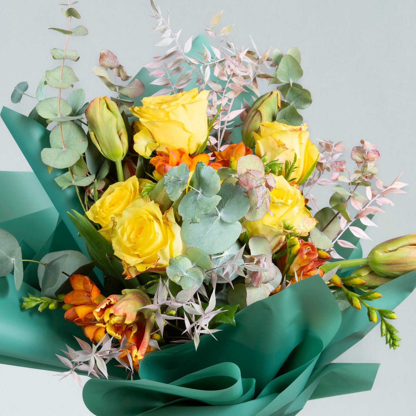 Sunburst Embrace: Yellow Roses and Orange Tulips Bouquet