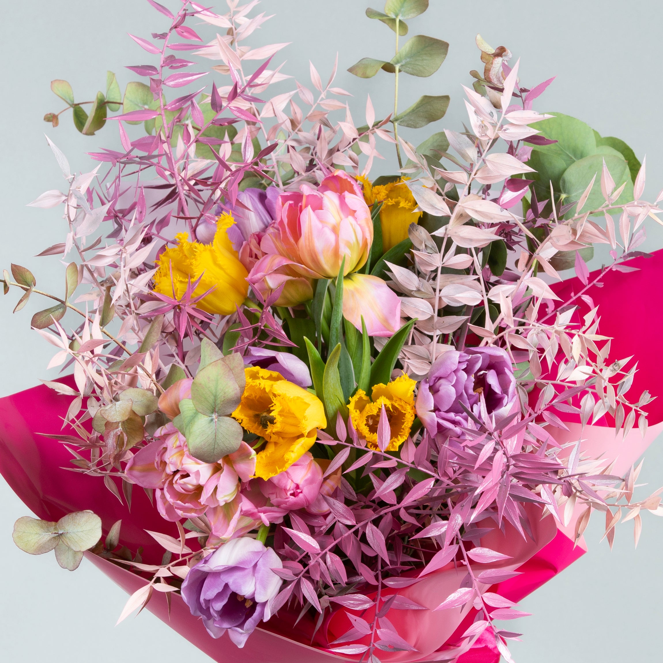 Colorful Serenity: Tulips and Eucalyptus Bouquet with Painted Ruscus