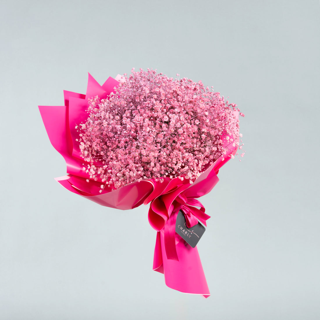 Artistic Whimsy: Painted Jib Sophil Bouquet with Elegant Packaging