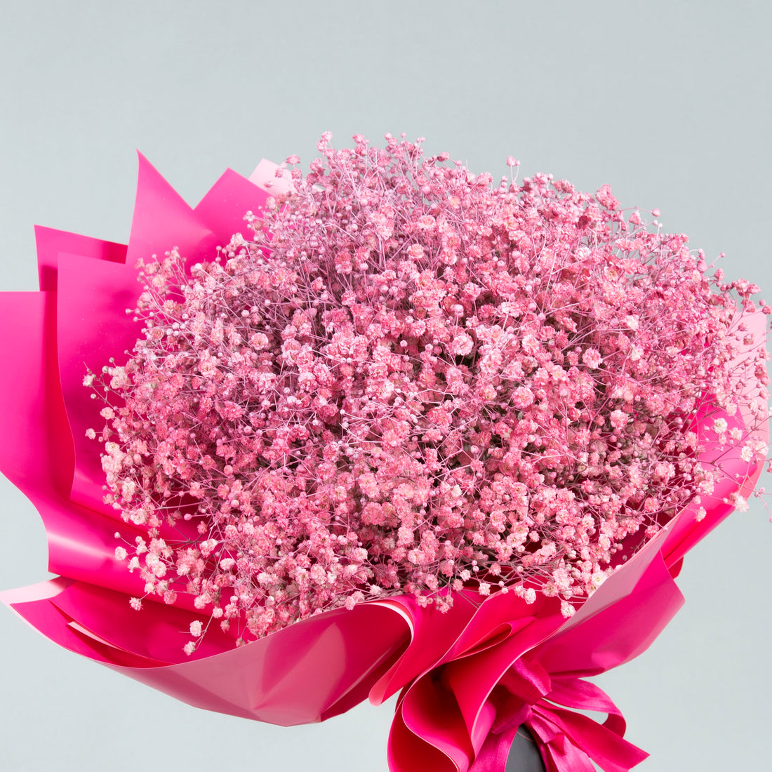 Artistic Whimsy: Painted Jib Sophil Bouquet with Elegant Packaging